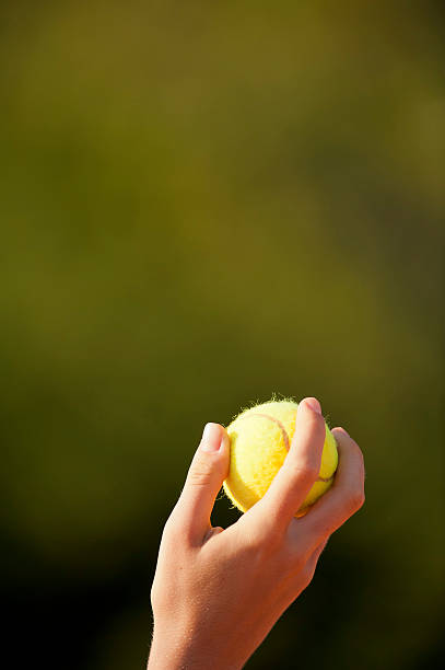 istock Throwing the tennis ball for serving 184861598