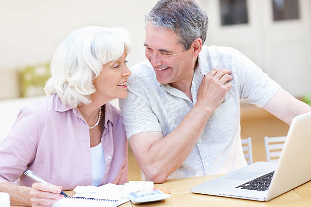 istock Senior couple discussing monthly expenses 184862329