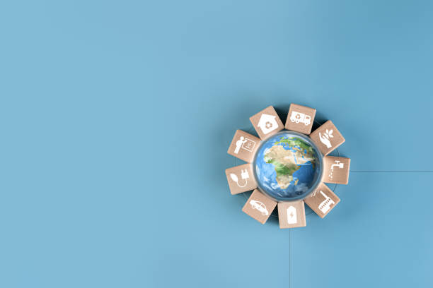 istock The globe is inside a glass globe surrounded by wooden blocks with eco-friendly campaign icons ,concept image of a campaign to reduce the amount of greenhouse gases accumulated in the earth's 1848626165