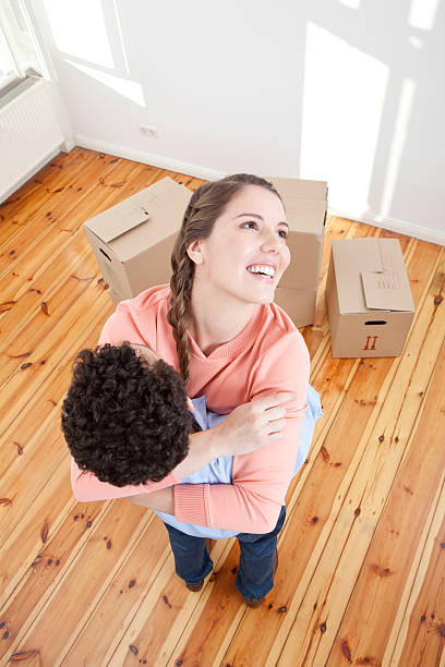 istock Couple having fun moving house 184862856