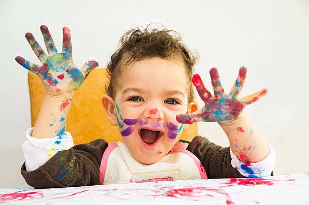 istock Little Girl Painting 184864016