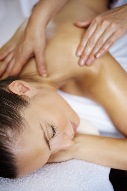 istock Calm woman getting a back massage 184864061