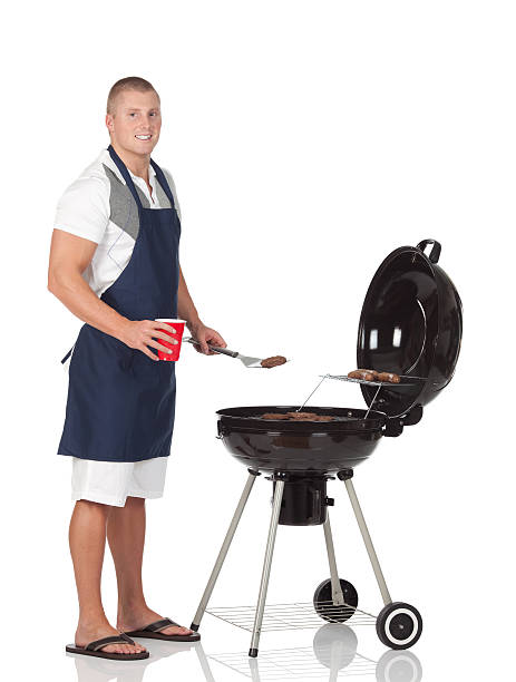 Man cooking on a barbecue grill