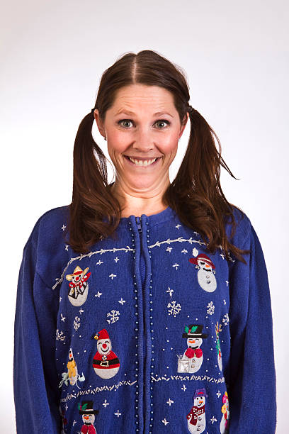 Silly sweater lady A goofy ugly sweater geek christmas ugliness sweater nerd stock pictures, royalty-free photos & images