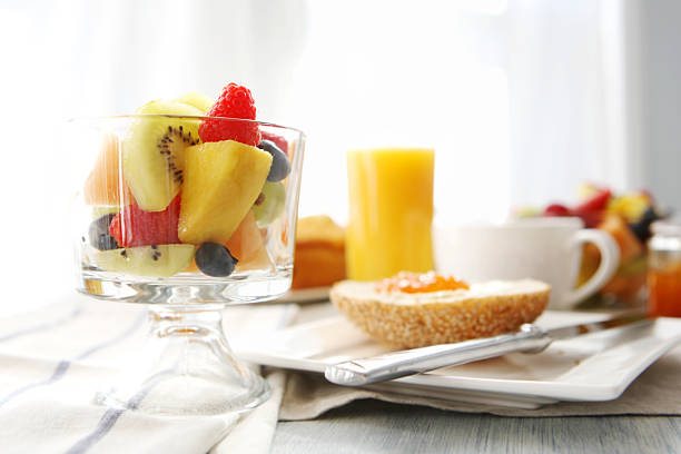 istock Breakfast- bread, butter,jam, coffee and fruit 184864825