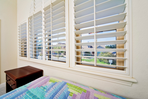 Bedroom window with opened blinds. Super wide 12mm lens on a FF sensor.