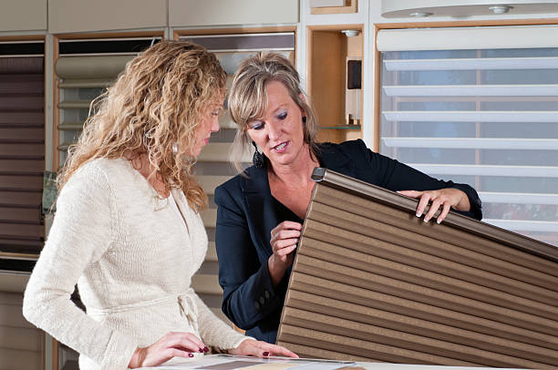 Woman Shopping for Window Shades stock photo