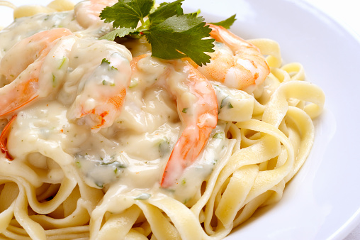 Pasta with Shrimp and Alfredo Sauce.