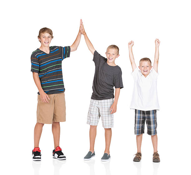 istock Boy cheering with his brothers 184866317