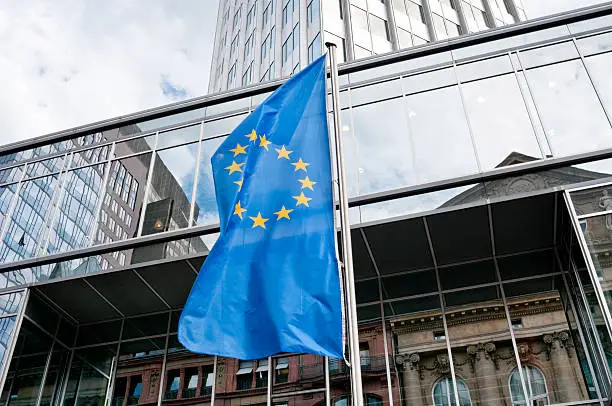 Flag of Europe in front of the Eurotower in Frankfurt am Main