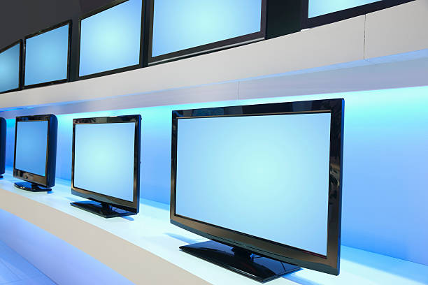 istock Rows of LCD TVs in TV Store 184867154