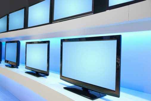 rows of modern LCD TVs,