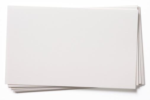 Stacked blank white cards isolated on white background with clipping path.