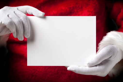 Santa Claus con tarjetas de felicitación photo