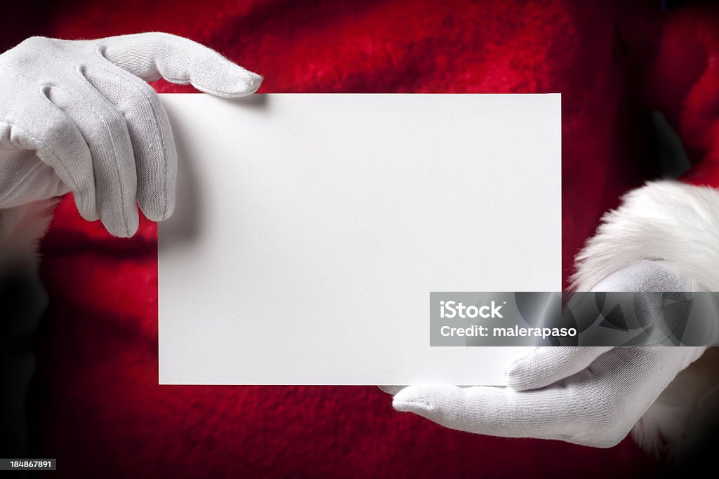 Santa Claus avec cartes de voeux - Photo de Père Noël libre de droits