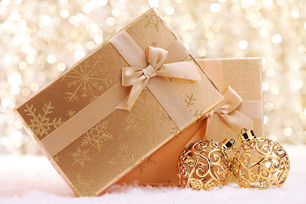 Golden christmas present with illuminated background