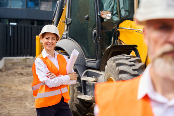 istock Team of project contractors inspecting building site 1848679980