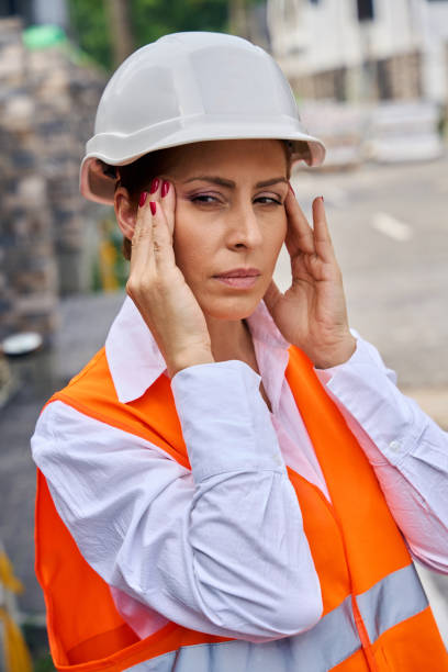 istock Tired building inspector suffering from tension headache on site 1848684172