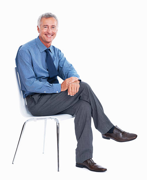 istock Relaxed business man sitting on chair 184868657