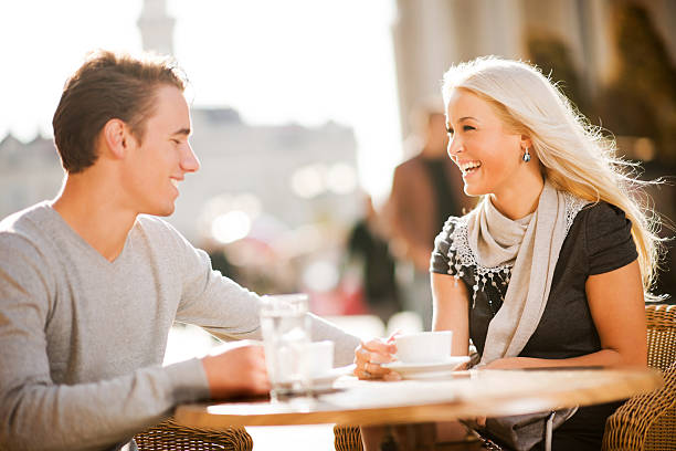 istock Beautiful couple sitting in a cafe. 184868664