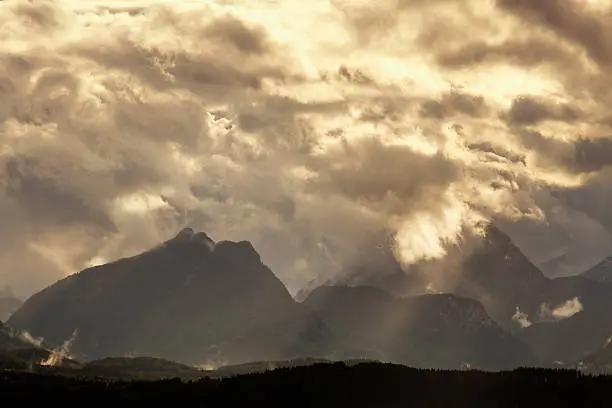 "stormclouds and sunshine - location: European Alps,"