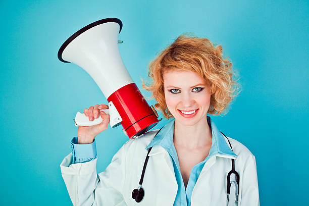 istock Female Doctor with Megaphone, Studio Portrait 184868928