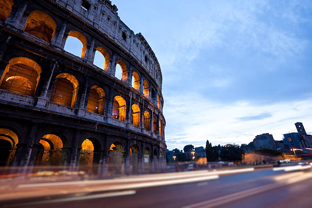 View of Colosseum illuminated at night in Rome, Italy