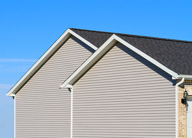 istock New home showing vinyl siding, roof 184870224