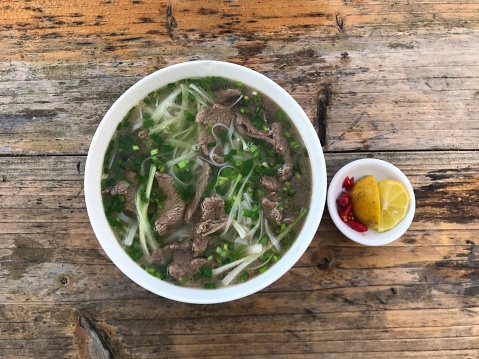 Vietnam Pho noodle soup with beef and vegetables