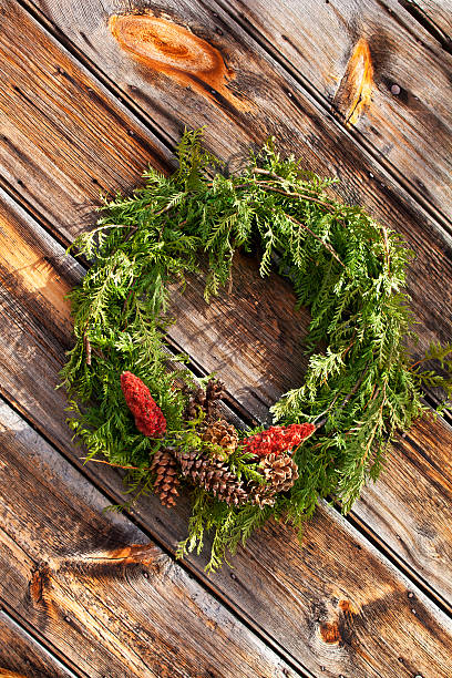 istock Christmas Wreath on Wood Wall 184870996