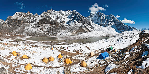 istock Expedition base camp dome tents snow mountain peaks Himalayas Nepal 184871286