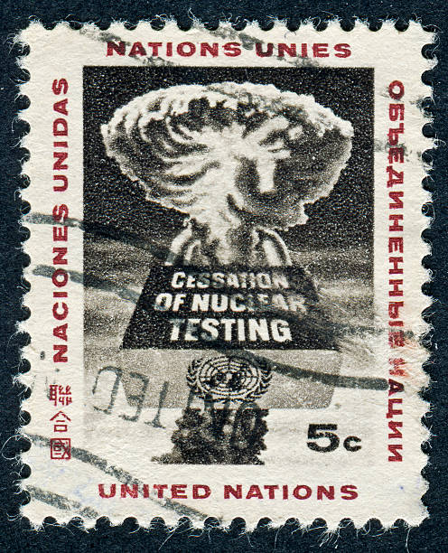 Nuclear Testing Stamp Cancelled United Nations Stamp Calling For The End To Nuclear Testing peace demonstration stock pictures, royalty-free photos & images
