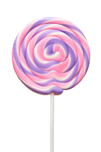 Close up of a large pink and purple swirl lollipop on a white background.See also