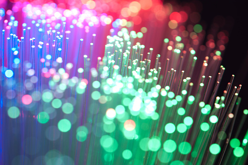 Blue, Red and green fibre optical cables on a black background