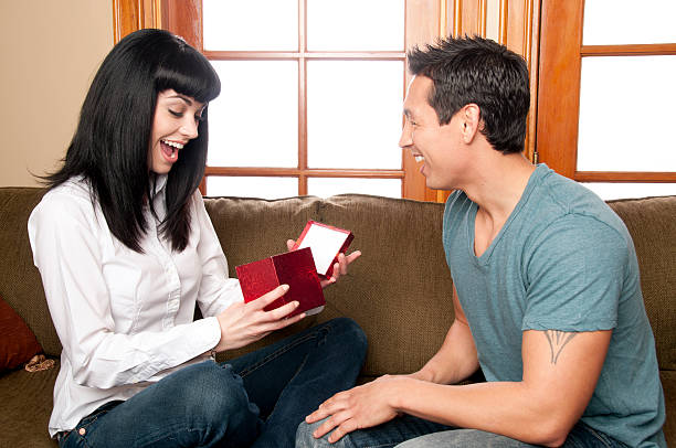 istock Girl Acts Surprise At Receiveng A Gift 184871432