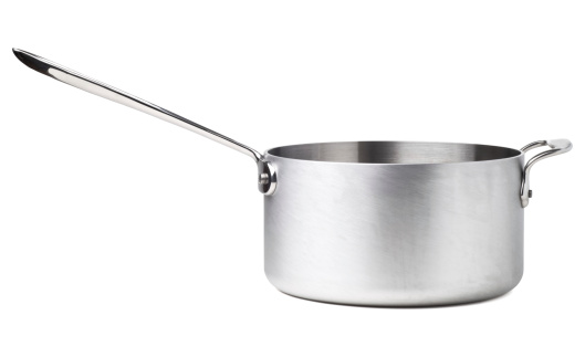 A stainless steel saucepan isolated on white with clipping path.  Side view.