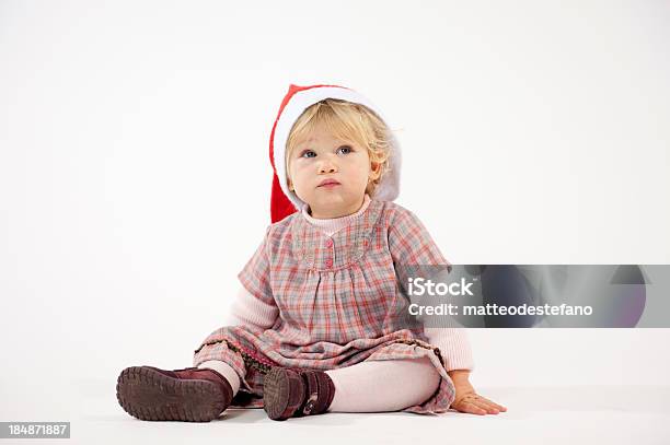 Cappello Da Babbo Natale - Fotografie stock e altre immagini di Bambine femmine - Bambine femmine, Bambino, Bebé