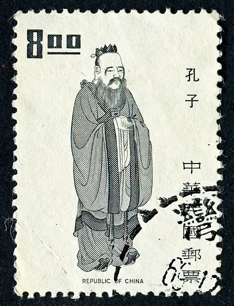Cancelled Stamp From China Featuring A Traditional Looking Person, I Think It Is Confucius