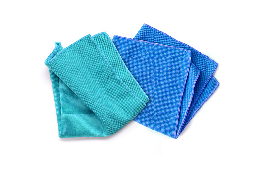 Two blue microfiber cleaning cloth on a white background