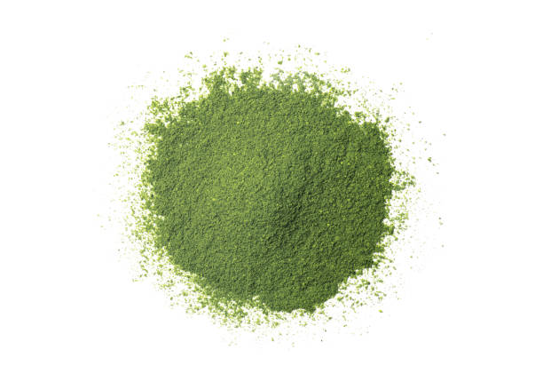 Pile of green powder Pile of green powder isolated on white background, top view, flat lay. chlorella stock pictures, royalty-free photos & images