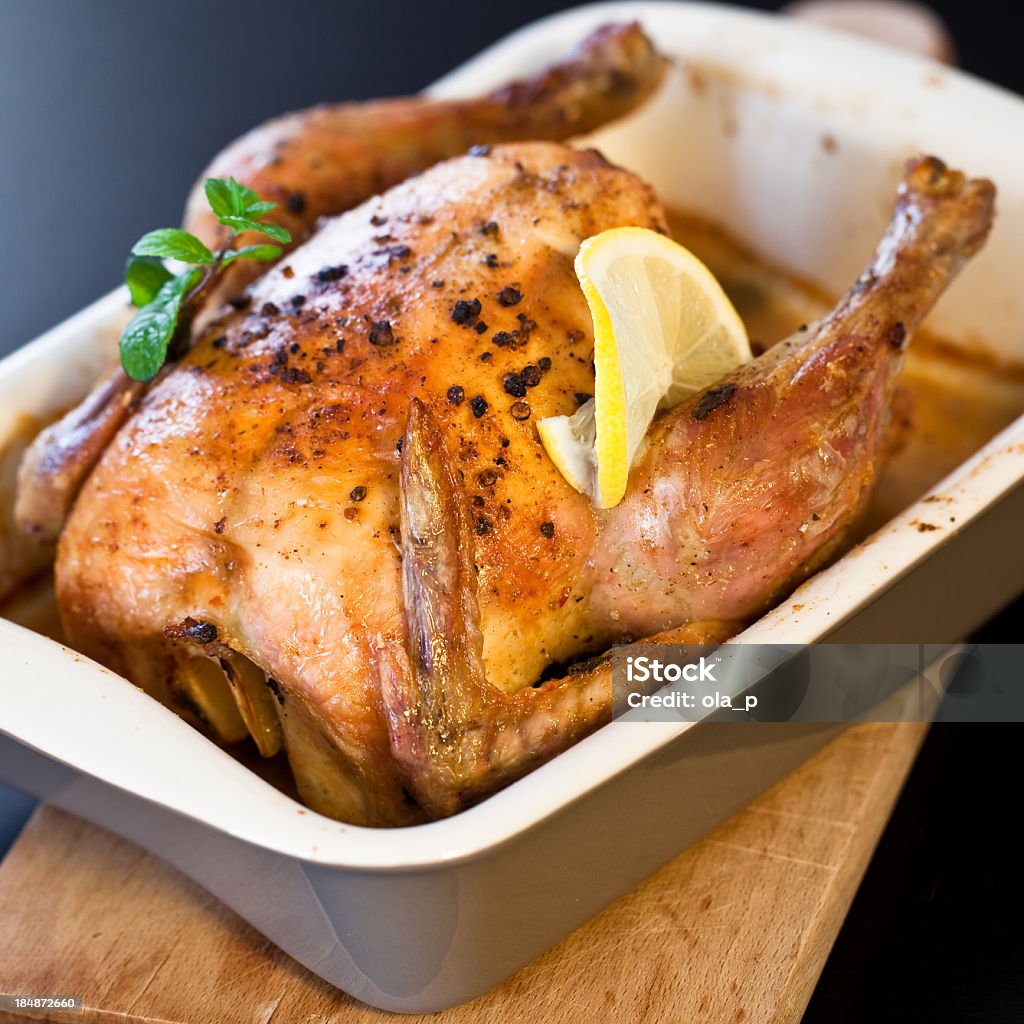 Pollo asado con menta y limón - Foto de stock de Pollo libre de derechos