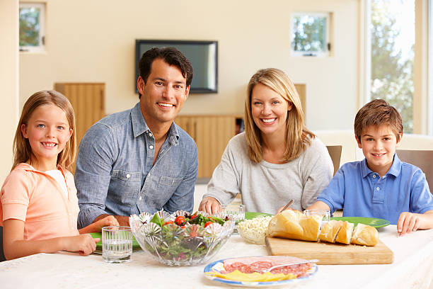 istock Family sharing meal 184873669