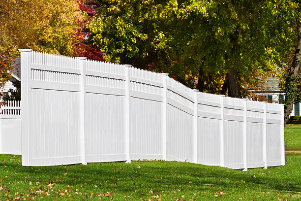 istock White vinyl fence 184873975