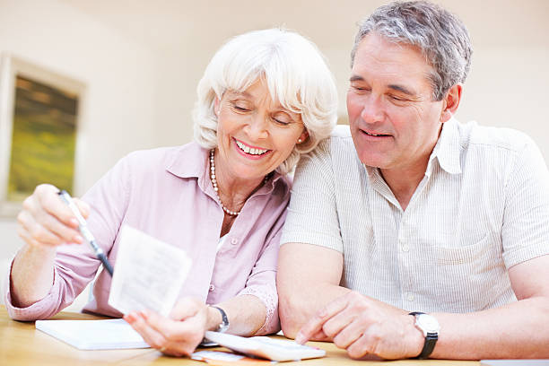 istock Senior couple doing finances together 184874007