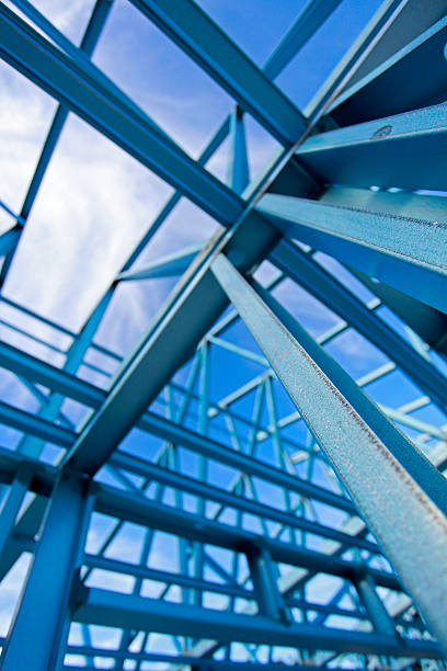 istock Steel house shot looking up on blue sunny day 184874010