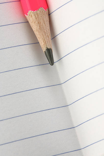 istock Blank page of striped notebook and pencil 184874316