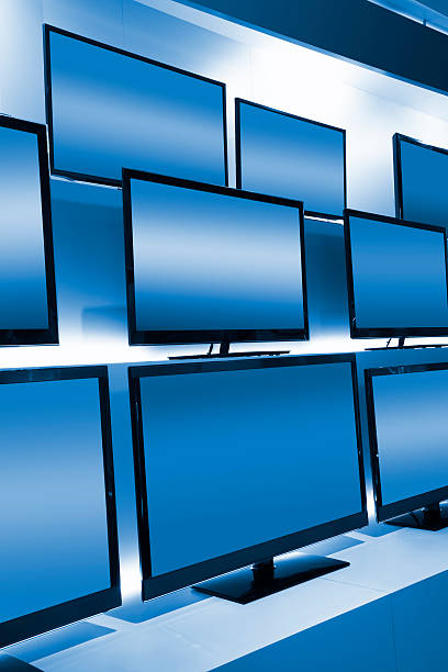 istock Rows of LCD TVs in TV Store 184874540