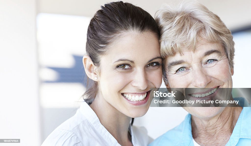 Quality time together Closeup portrait of a young daughter embracing her smiling senior mother at retirement home - copyspace Active Seniors Stock Photo