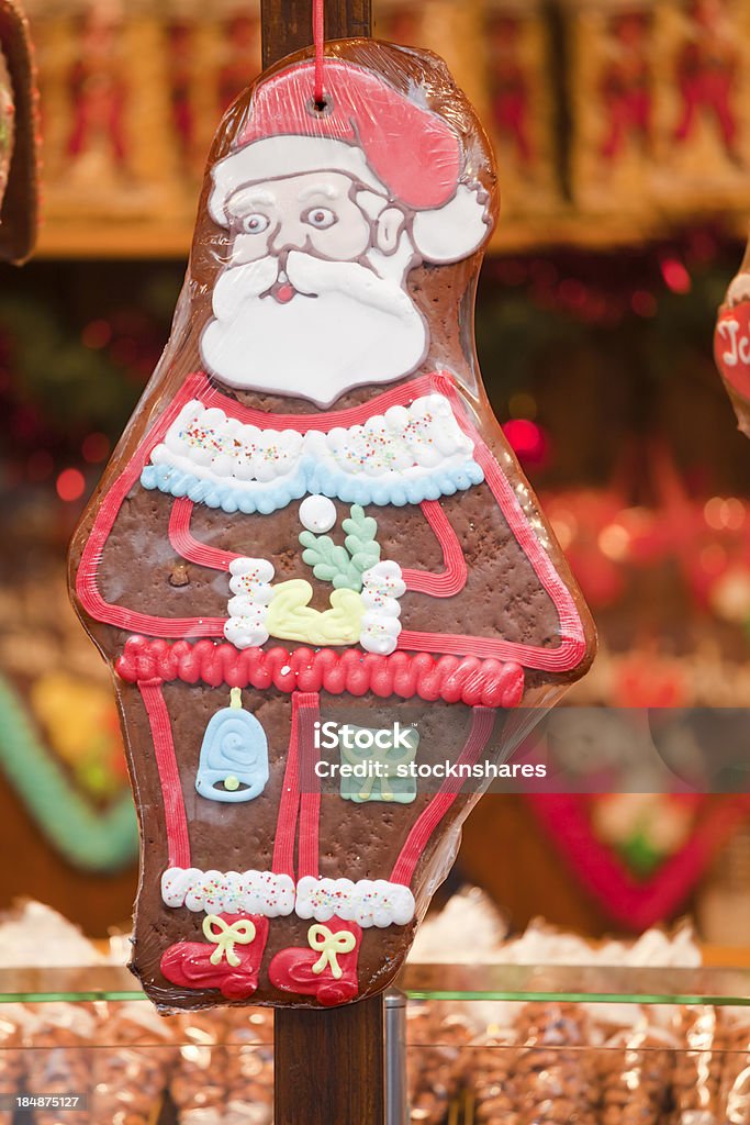 Santa Gingerbread "The German tradition of Gingerbread cookies, cut into a Santa Claus shape, with decorative icing. On display at a German Christmas Market in Cologne, during Advent." Advent Stock Photo