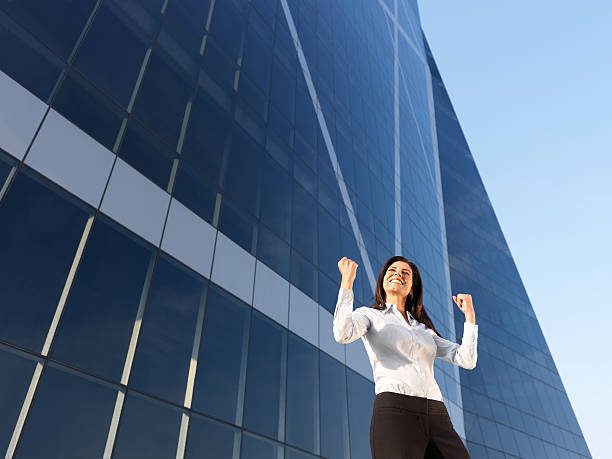 istock Successful business woman celebrating 184875267